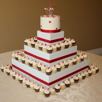Heart Cupcake Tower Thanks to Antonia74 for the stand instructions. 108 mini cupcakes, half white butter cake, half chocolate butter cake, all iced in vanilla...