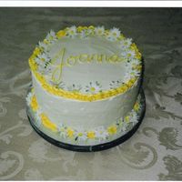 Daisy Birthday Cake Lemon Butter Cake with Lemon Curd and IMBC. Iced in IMBC, with gumpaste daisys.