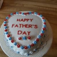 Last Minute Father's Day Cake top layer is Devil's Food, bottom is white. Did it as a last minute cake for FIL and BIL