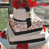 White, Black And Red All fondant. Bottom tier - Italian Cream/cream cheese; middle - lemon/lemon bc; top - choc/choc bc. Edible glitter on bottom and RI...