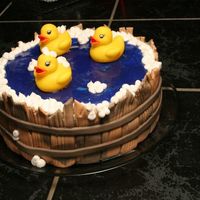 Just Ducky Chocolate fudge cake with buttercream filling. Fondant trim with store bought ducks. My first try at using fondant for more then figures....