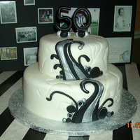 50Th Birthday Cake Contemporary design inspired by the many pictures on cake central!! Covered in MMF