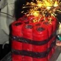 Dynamite Cake chocolate cake covered in red fondant