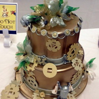 Clean, Clean, Clean this cake was based on metallics- I wanted to play with my metallic colors....the cake is airbrushed 8 colors-it started out stark white,...