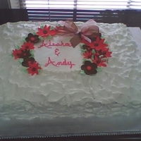 Bridal Shower Cake Half french vanilla / half chocolate cake with buttercream icing and fondant flowers.