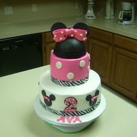 Minnie Mouse Cake Fun cake for a 2 year old. She likes Minnie Mouse & zebra stripes.