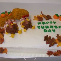 Thanksgiving_Cake_003.jpg This was my first attempt at fondant turkeys. Thanks to the great instructions posted on CC.