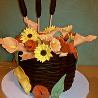 Fall Flower Bouquet Cake Fondant flowers, and chocolate fondant woven basket.Normally I will acknowledge any inspiration I have for cakes. But this cake was just...