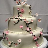 Cherry Blossom Wedding Cake White fondant covered cake with gum paste and fondant cherryblossoms