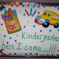 Cierra's Going To Kindergarten Cake Made for my daughter's "Going to Kindergarten" party this past weekend. Orange cake and crusting cream cheese icing. Candy...