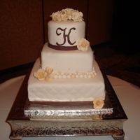 Ivory Fondant Wedding This cake has forndant and handmade gumpaste flowers.