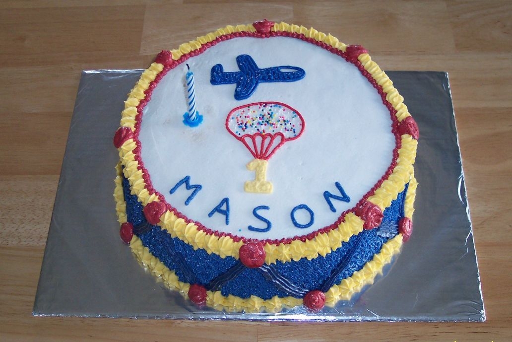 Drum Cake My youngest son's first birthday. All buttercream. We are a military family so his "1" is parachuting in.