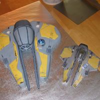 Anakin's Jedi Starfighter Made for my son's 7th birthday this past weekend. The small one on the right is the picture I was attempting to copy. Wings were David...