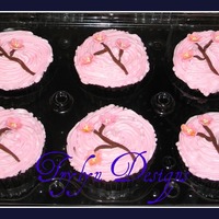 Cherry Blossom 5 dozen 1/2 choc./choc fudge and 1/2 french vanilla/buttercream. cherry blossoms made from gumpaste. TFL