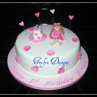 1St Birthday Birthday cake for my neighbour's daughter. 9" lemon/rasp cc, gumpaste decorations. French vanilla cupcakes. TFL