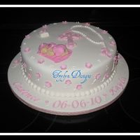 1St Communion/baby Christening Combination cake for 2 little girls, 1st communion and christening. Lemon with lemon cream cheese. Fondant and gumpaste decorations. TFL