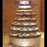 Cupcake Wedding 6and 9" wasc/rasp.cc and 150 cupcakes in different flavours and fillings. Gumpaste flowers on cupcakes. TFL