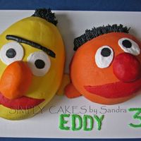 Bert And Ernie Yellow cake with Chocolate filling. Iced in BC. Thanks for all the inspiration in this site. All is cake but the ears.