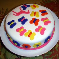 Flowers And Butterflies This was a cake I made for my daughter for her sixth birthday. My first attempt at using fondant. Also my first attempt making a cake with...