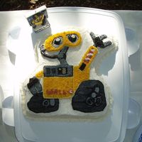 Wall-E Wilton Cake My latest Wilton character cake. Got many compliments. I mixed the dark gray too dark. And could not find my #1 tip, and had to make do...