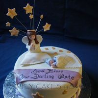 Baptism Cake Yellow cake with strawberry filling. Covered in fondant. Angel and baby in gumpaste. I was so happy with this cake. I am just self learning...