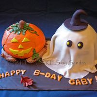 Halloween Birthday Halloween Birthday cake for a 7 years old girl. Pumpkin in BC, and ghost and accents in Fondant. Chocolate cake with Strawberry filling....