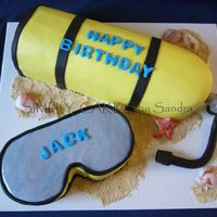 Scuba Tank Scuba tank carved out of a square pan. Marble cake with Chocolate filling. Covered in MMF and sand made out of vanilla cookies. Tanks so...