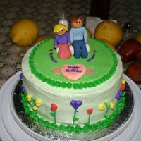 Grandparents' Birthday Cake Buttercream cake with fondant figures for my husband's grandparents! Way fun! =)