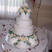 My Daughter's Wedding Cake I made this cake for my daughter's wedding in October. It wasn't near as perfect as I would have liked it, and the middle layer...
