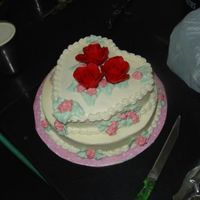 Peanutcake 1st attempt in India - eggless peanut cake with Dulce de Leche filling iced in all butter BC, thus the off color and melting from the heat...