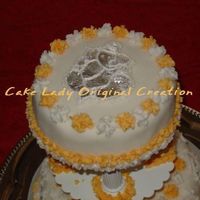 Ganesha Chaturthi This was my first decorated cake for Ganesha Chaturthi a couple years back. Eggless coconut cake with mango filling, iced in BC with silver...