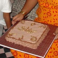 Chocolate! Chocolate cake, iced in chocolate BC topped with chocolate accents painted with dust.1 of 2 cakes I did in India and OMG soooo difficult to...