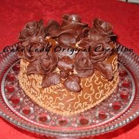 Chocolate Lovers Cake Chocolate cake, Chocolate mousse filling, whipped chocolate ganache and handmade chocolate roses.