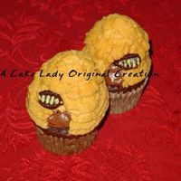 Honeybee Cupcakes Chocolate cupcakes topped with chocolate mousse, decorated in BC with chocolate bees.