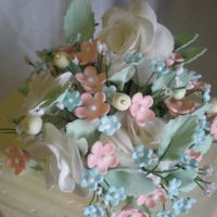 Wedding Spray My first try at a gumpaste floral bouquet. It took waaaaaay longer than I expected. But the product at the end is so worth it.