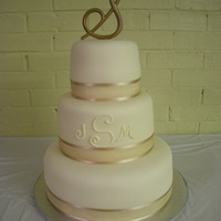 Wortham Wedding Cake White chocolate cake with white chocolate MMF. TFL!