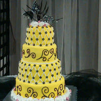 Yellow Wedding 12" chocolate, 10" strawberry, 8" red velvet and 6" white chocolate. Made for my neices wedding (she designed the cake...