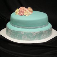 Tiffany Blue Wedding Shower This cake was made for a friend who was hosting a bridal shower. The colors were tiffany blue, brown and pink but I chose to leave the...
