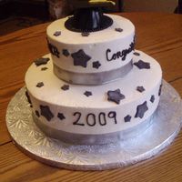 Star Graduation Black fondant stars with silver luster, Italian Meringue Buttercream and Silver ribbon