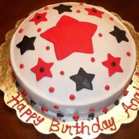 Stars Birthday Cake Red and Black fondant stars with buttercream icing and buttercream filling