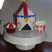 Carnival 6 inch carnival tent was the cupcake stand topper. Popcorn and mini-tent cuppies. Thanks for looking!