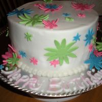 Daisy Birthday Cake Iced with Buttercream with fondant daisies