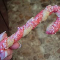 Candy Cane Cookies Candy cane cookies brushed with butter, then topped with crushed candy canes.