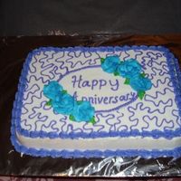Anniversary Cake Made this cake for my parent's 13 Anniversary. I had intended that every thing be blue, but trying to get a different blue, I added...