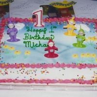 Michaels_1St_Bday.jpg My first attempt at using spray mist. I bought everything for this cake at the bakery, because I didnt know about Michaels and the other...