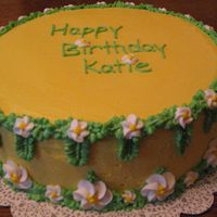 Img_1362.jpg buttercream icing and leaves, royal icing flowers.