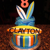 Surfboard Birthday Boy! I did this cake for a boy who was having a swim birthday party. His mom had shown me a surfboard cake with several boards but Clayton'...