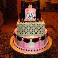 Julia's Cake I made this for a dear friend having her first child. It is a 12" round, 8" square and 6" round. It is all buttercream with...