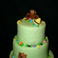 Curious George Hunts Eggs 3rd birthday party with curious george. The activity was hunting eggs so we incorporated that.