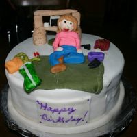 Shopper birthday cake for friend that is a photographer and shopaholic. made her Mac and her camera and her camerabag. All fondant.